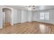 Spacious living room with wood-look flooring and an abundance of natural light at 849 E Impreria St, San Tan Valley, AZ 85140