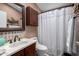 Bathroom with a vanity, a shower with a white curtain, and decorative fish mirror at 8500 E Southern Ave # 447, Mesa, AZ 85209