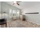 Bright bedroom with large windows, white trim, and tile floors at 8500 E Southern Ave # 447, Mesa, AZ 85209