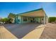 Spacious carport providing ample covered parking and access to the home's entrance and additional storage at 8500 E Southern Ave # 447, Mesa, AZ 85209
