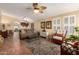 Spacious living room with tile floors, neutral walls, comfortable seating, and lots of light at 8500 E Southern Ave # 447, Mesa, AZ 85209