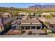 Gorgeous aerial view of the backyard space highlighting community and mountain views at 8541 E Canyon Estates Cir, Gold Canyon, AZ 85118