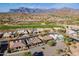 Desert community with a golf course and mountain views, capturing the essence of luxury living at 8541 E Canyon Estates Cir, Gold Canyon, AZ 85118