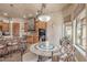 Dining room features a decorative table, chairs, and natural light at 8541 E Canyon Estates Cir, Gold Canyon, AZ 85118
