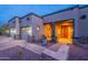 Charming single-story home featuring a two-car garage, desert landscaping and brick driveway at 8541 E Canyon Estates Cir, Gold Canyon, AZ 85118
