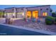 Charming single-story home featuring a two-car garage and desert landscaping at 8541 E Canyon Estates Cir, Gold Canyon, AZ 85118