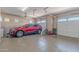 Well-organized three-car garage with epoxy floors provides ample space for vehicles and projects at 8541 E Canyon Estates Cir, Gold Canyon, AZ 85118