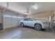 A clean garage features an epoxy floor and ample space for a vehicle and storage at 8541 E Canyon Estates Cir, Gold Canyon, AZ 85118