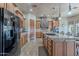 Spacious kitchen featuring an island with granite countertops and stainless steel appliances at 8541 E Canyon Estates Cir, Gold Canyon, AZ 85118
