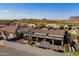 Home with covered patio and desert landscaping, offering serene outdoor living and mountain views at 8541 E Canyon Estates Cir, Gold Canyon, AZ 85118