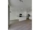 Bright and modern kitchen with white cabinets, stainless steel appliances and island at 9327 E Static Ave, Mesa, AZ 85212