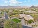 Aerial view of the property highlighting the landscaped grounds and mountain views at 9513 N 129Th Pl, Scottsdale, AZ 85259