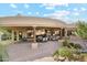Expansive covered patio perfect for entertaining with dining and lounge areas at 9513 N 129Th Pl, Scottsdale, AZ 85259