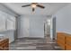 Bedroom with wood-look floors, white walls, and neutral trim at 986 Leisure World --, Mesa, AZ 85206