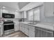 Kitchen area with stainless steel appliances and updated cabinets at 986 Leisure World --, Mesa, AZ 85206