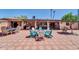 Spacious backyard with a seating area, patio, and a well-manicured lawn perfect for outdoor activities at 10602 N 35Th St, Phoenix, AZ 85028