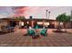 Inviting backyard with brick patio, comfortable seating, outdoor bar and a charming citrus tree at 10602 N 35Th St, Phoenix, AZ 85028