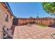 Spacious backyard features a mix of tile, wood fencing, and decorative elements at 10602 N 35Th St, Phoenix, AZ 85028