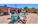 Spacious backyard featuring a built-in bar area and seating by the fire pit at 10602 N 35Th St, Phoenix, AZ 85028