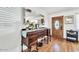 Elegant entryway with a wooden door, detailed console table, and tasteful decor at 10602 N 35Th St, Phoenix, AZ 85028