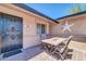 Cozy outdoor patio area with modern furniture and a charming star decoration at 10602 N 35Th St, Phoenix, AZ 85028