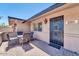 Charming patio area featuring a table set and well-maintained brick flooring at 10602 N 35Th St, Phoenix, AZ 85028