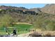 Picturesque golf course surrounded by desert landscape and mountain views at 13126 E Turquoise Ave, Scottsdale, AZ 85259