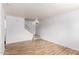 Spacious living area features a staircase and new laminate flooring throughout at 1316 N 85Th Pl, Scottsdale, AZ 85257