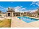 Community pool with lounge chairs at 1316 N 85Th Pl, Scottsdale, AZ 85257