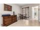 Bedroom with a cozy seating area and an attached bathroom at 13311 W Copperstone Dr, Sun City West, AZ 85375