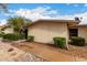 Cozy single-story home featuring desert landscaping, a tidy exterior, and a welcoming walkway at 13311 W Copperstone Dr, Sun City West, AZ 85375