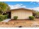 Single-story home with desert landscaping, including a walkway and meticulously maintained exterior at 13311 W Copperstone Dr, Sun City West, AZ 85375