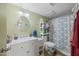 Updated bathroom features a vanity with storage and a shower-tub combination at 14002 N 49Th Ave # 1094, Glendale, AZ 85306