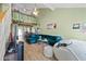 Bright living room with a soaring ceiling, leafy decorations, and comfortable seating at 14002 N 49Th Ave # 1094, Glendale, AZ 85306