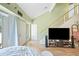 Open living space with stairs, a large window and a cozy sitting area at 14002 N 49Th Ave # 1094, Glendale, AZ 85306