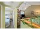 Open loft space overlooking a bedroom and living area at 14002 N 49Th Ave # 1094, Glendale, AZ 85306