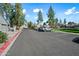 Well maintained parking lot with ample parking space and beautiful surrounding landscape at 14002 N 49Th Ave # 1094, Glendale, AZ 85306