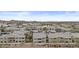 Community aerial view showcasing the complex, water features, desert landscaping, and mountain views in the background at 16013 S Desert Foothills Pkwy # 2120, Phoenix, AZ 85048