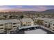 Serene aerial view of a condo community with mountain views and covered parking at 16013 S Desert Foothills Pkwy # 2120, Phoenix, AZ 85048