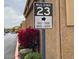 Building 23 sign amidst landscaping, indicating apartment numbers for convenient resident navigation at 16013 S Desert Foothills Pkwy # 2120, Phoenix, AZ 85048