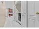 Conveniently located laundry room with washer and dryer hookups, plus shelving at 16013 S Desert Foothills Pkwy # 2120, Phoenix, AZ 85048