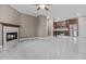 The open-concept floor plan boasts tile floors, a fireplace and easy access to the kitchen at 16013 S Desert Foothills Pkwy # 2120, Phoenix, AZ 85048
