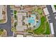 Aerial view of a luxurious pool surrounded by lush landscaping and lounge chairs at 16013 S Desert Foothills Pkwy # 2120, Phoenix, AZ 85048