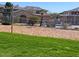 Sandy volleyball court with manicured grass, perfect for enjoying outdoor recreation in a resort-like community at 16013 S Desert Foothills Pkwy # 2120, Phoenix, AZ 85048