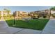 Exterior view of community pond and gazebo surrounded by green space and residential buildings at 1645 W Baseline Rd # 2122, Mesa, AZ 85202