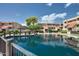 Scenic condo community with pond, mature trees, and waterfront gazebo at 1645 W Baseline Rd # 2122, Mesa, AZ 85202