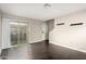 Bright living room with a sliding glass door to the balcony at 1645 W Baseline Rd # 2122, Mesa, AZ 85202