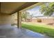 Covered patio that opens to the backyard surrounded by a privacy wall at 18624 E Cattle Dr, Queen Creek, AZ 85142