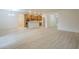 Open-concept living space featuring a modern kitchen, dining area, and spacious living room at 18624 E Cattle Dr, Queen Creek, AZ 85142