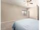 Bright bedroom with neutral carpet and ceiling fan at 19061 N Toya St, Maricopa, AZ 85138